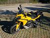 Well guys and gals, I found a new steed-yellow_ducati_multistrada_1200_02.jpg