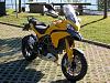 Well guys and gals, I found a new steed-yellow_ducati_multistrada_1200_01.jpg